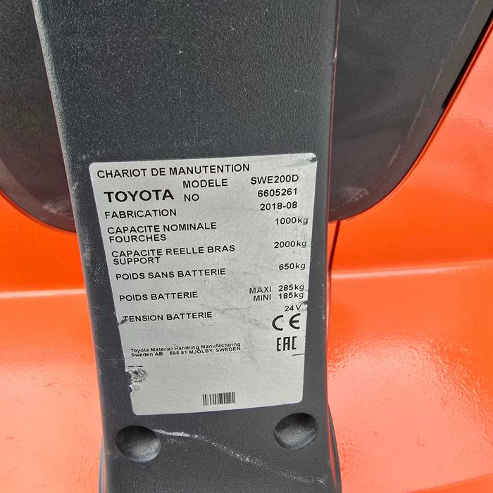 Paleciak elektryczny z niskim masztem Toyota Swe 200 unoszone ramiona