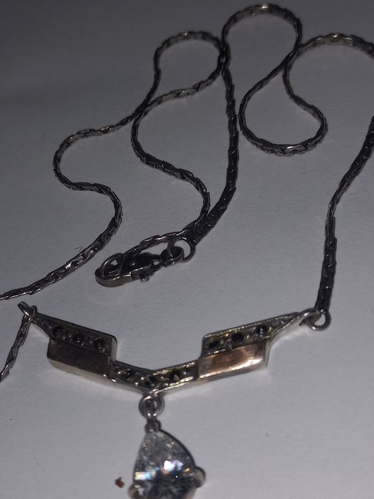 Срібне кольє,950проби з вставками 583проби.з марказітами та хрусталем.
