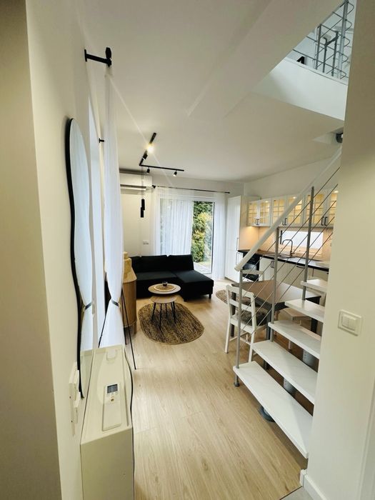 Nowe dwupoziomowe mieszkanie   z patio i ogrodem