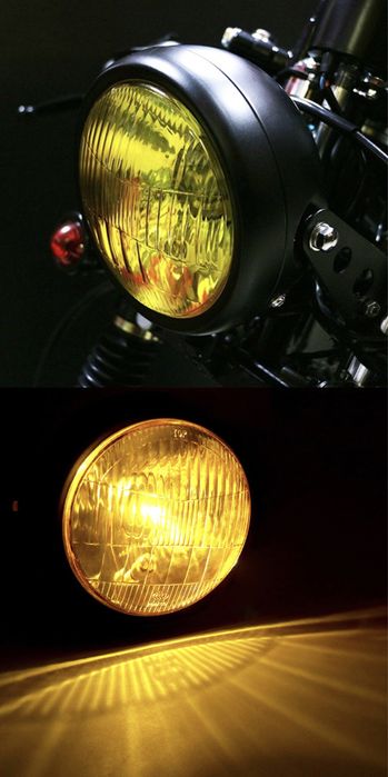 Farol frontal preto lente amarela dois apoios laterais
