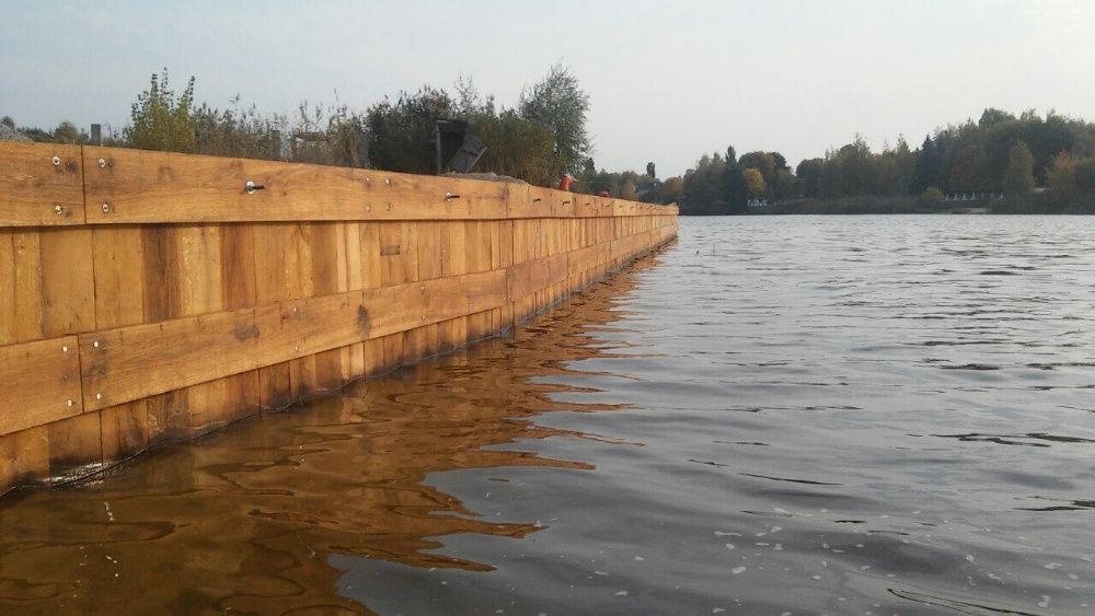 Укріплення берега, дерев'яні шпунти, берегоукріплення дубом