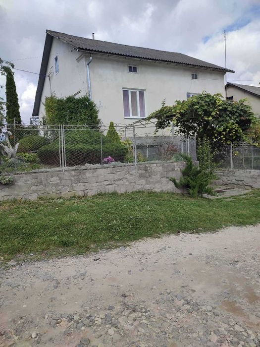 Житловий будинок та земельна ділянка 5,58 сот. м. Перемишляни