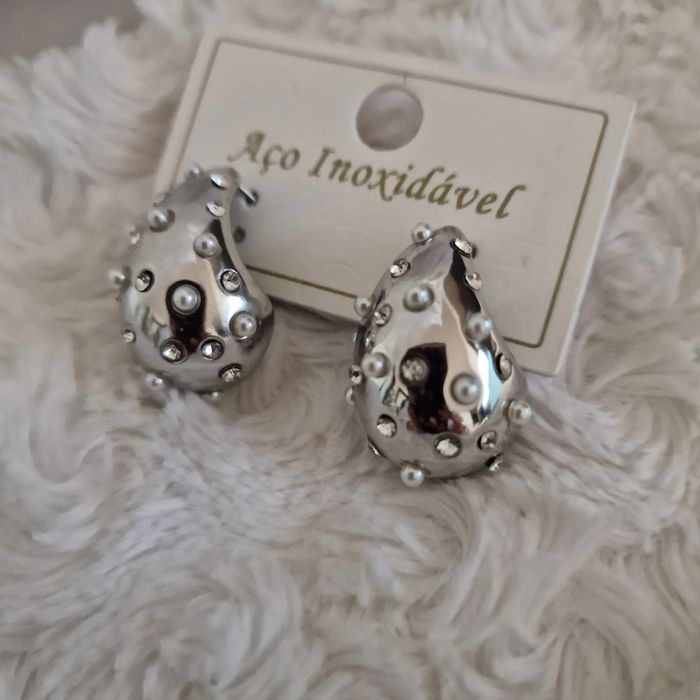 Brincos em aço inoxidavel