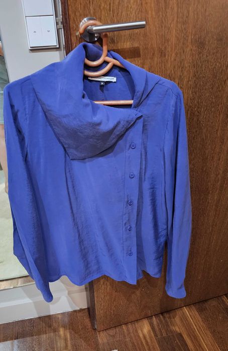 Camisa com gola larga