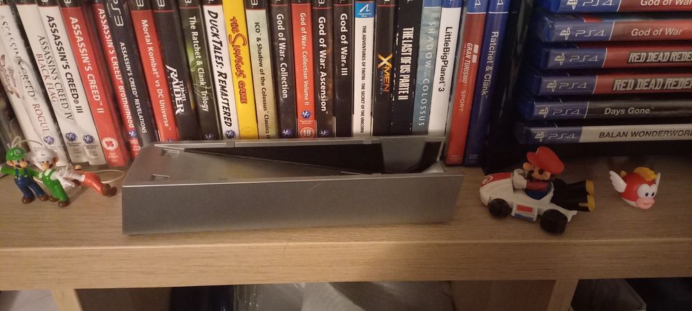 Base para consola Wii oficial

- Cor prateado.

Irei colocar mais jog