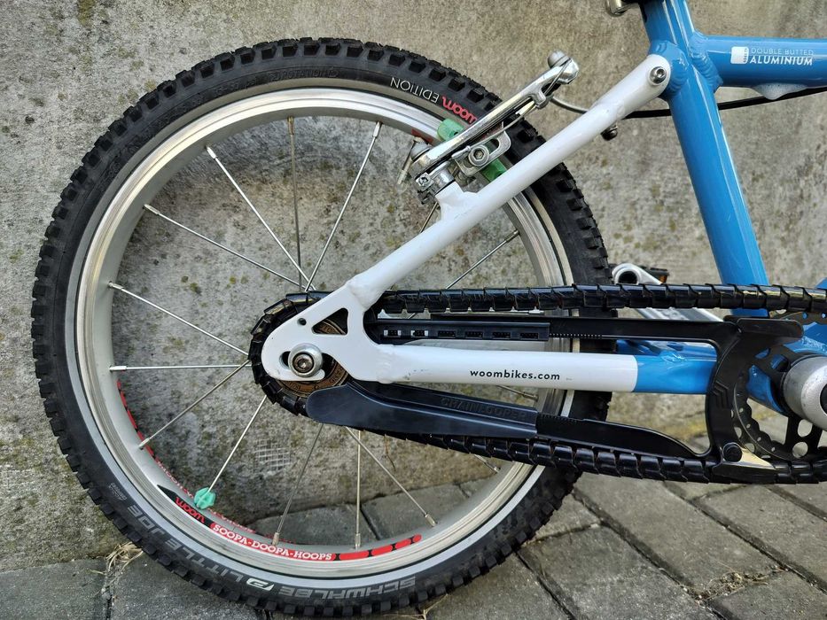 Woom 3 niebieski rower z dzwonkiem