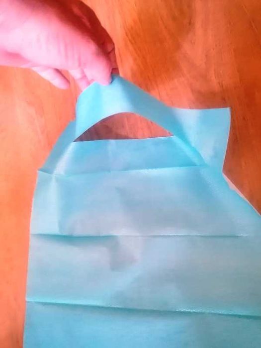 Babetes descartáveis com bolsa