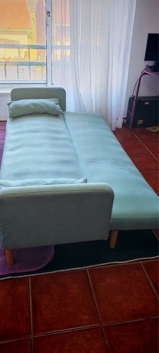 Sofa cama azul marinho que faz de cama