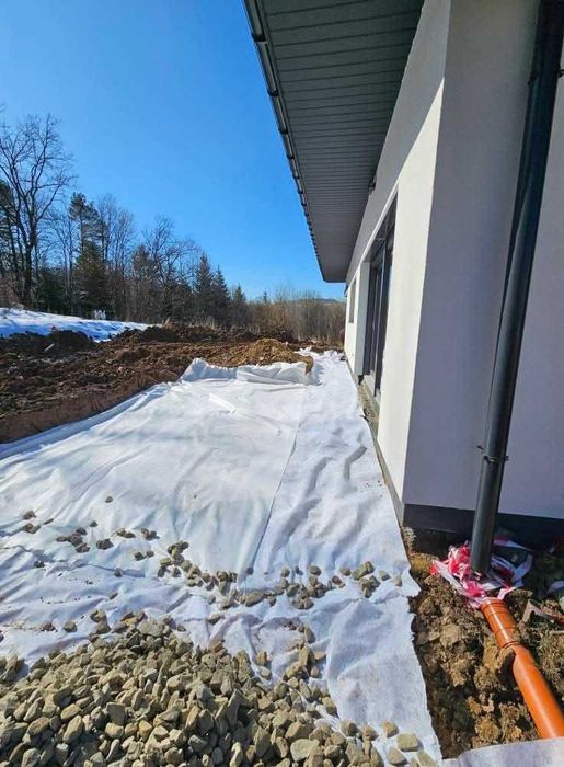 Usługi koparką odwodnienia budynków drenaż przydomowe oczyszczalnie