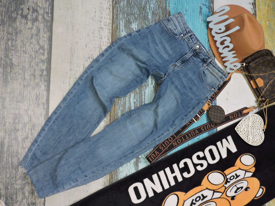H&M Świetne spodnie relaxed jeans 40