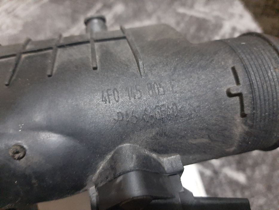 Радіатор інтеркуллера лівий Audi A6 C6 2.7 3.0 з датчиком