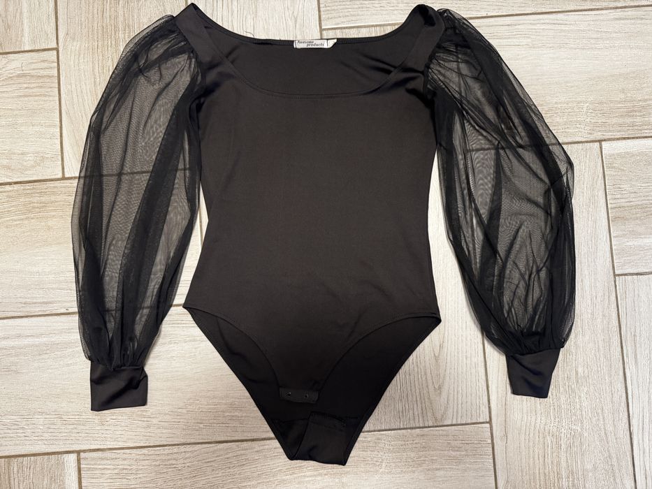 Боді. Дуже гарно сидить.