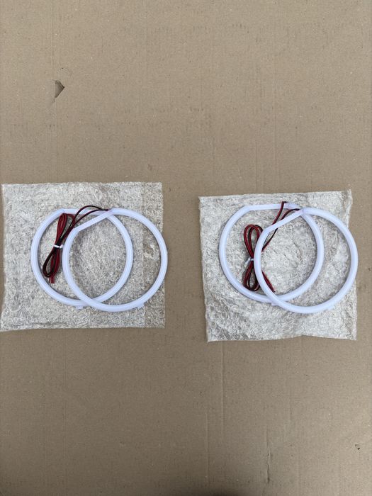 BMW E39 Ringi Cotton POLIFT Hella zestaw Plug and Play Mocne Białe