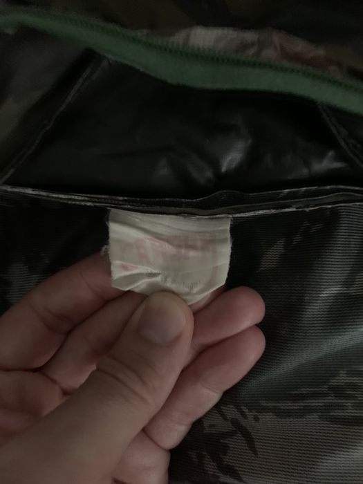 Impermeável camuflado