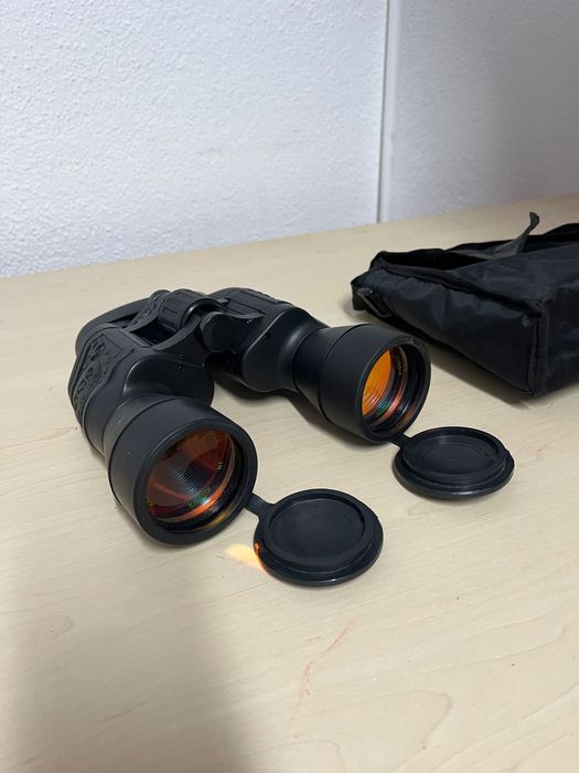Vendo binóculos de mão