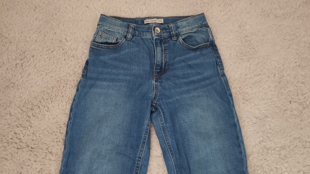 Spodnie jeans z dziurami