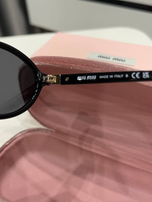 Солнцезащитные очки Miu Miu