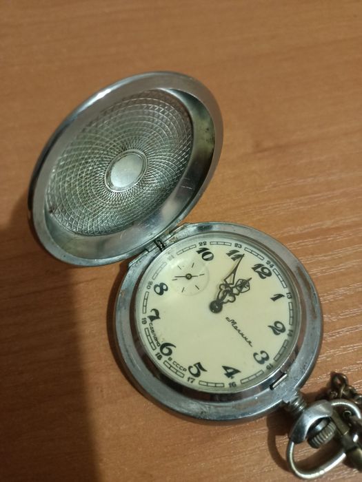 Часы молния глухарь