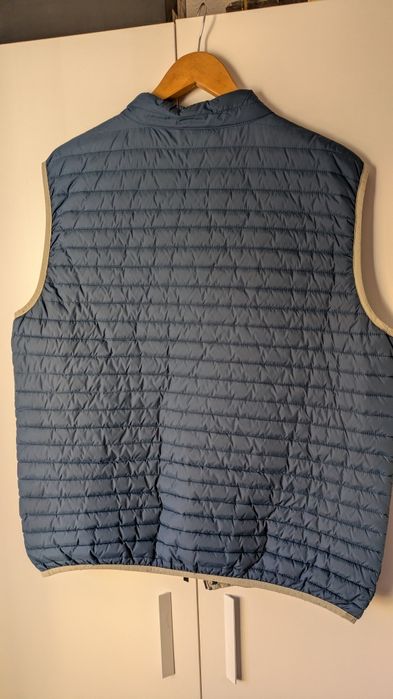 Casaco sem mangas como novo é um L