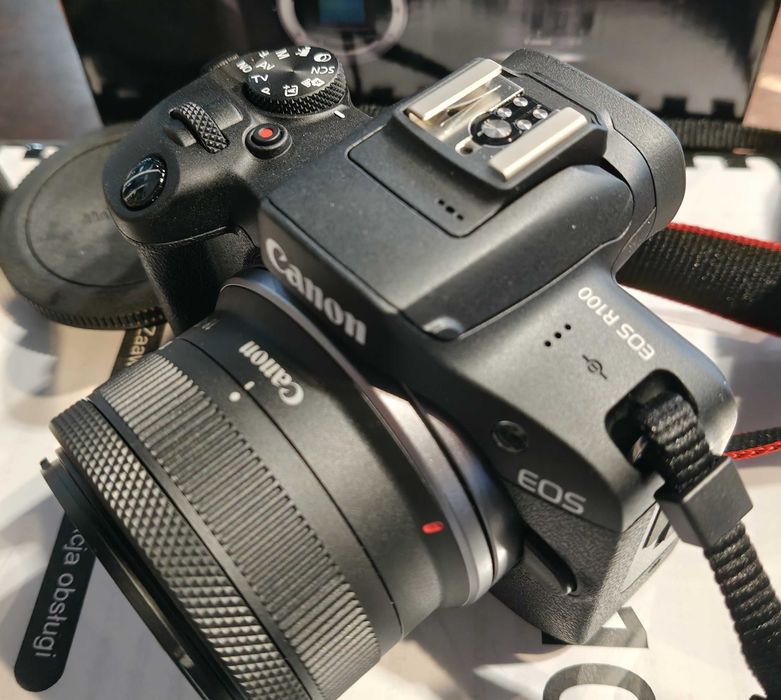 Aparat fotograficzny CANON EOS R100/Obiektyw/Ładowarka, Bateria/Warto
