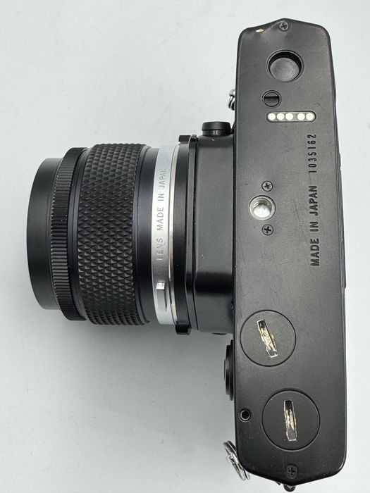 Olympus OM-4 + Zuiko 28mm f/2.0 MC Rare