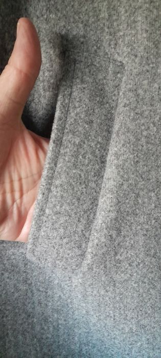 Canadiana cinza claro com bolsos