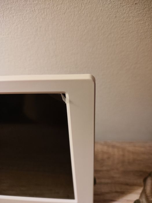 Moldura digital ainda com película Nova