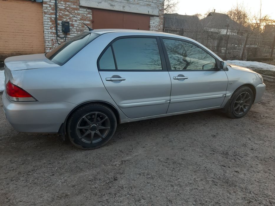 Мітцубісі Ланцер  9 з газом 4.