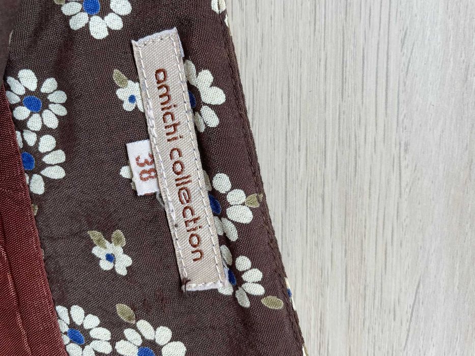 Mini saia castanha florzinhas 34