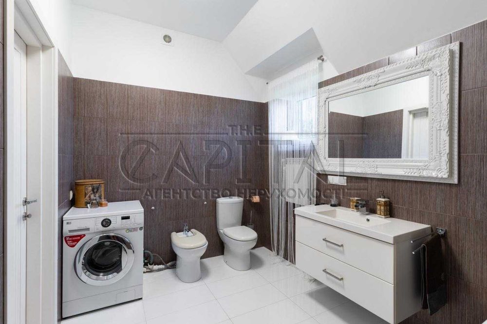 Продаж сучасного будинку 280 м² з підвалом 80 м² на ділянці 12 соток у Вишеньках