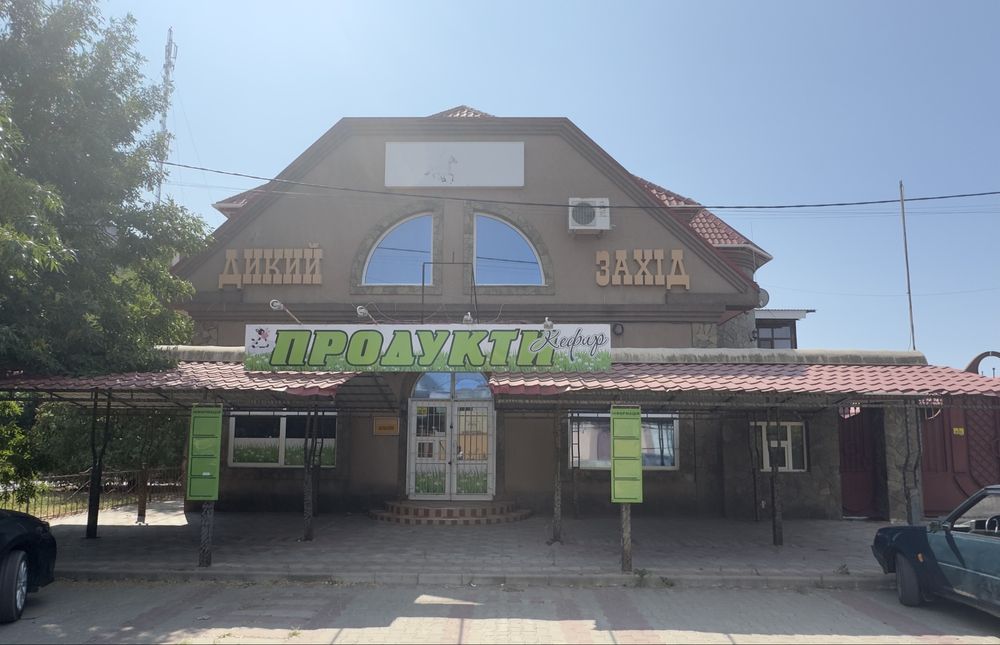 Дом с магазином, кафе, бильярдная, сауна Северный