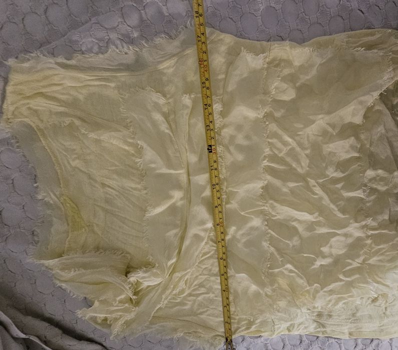 T-shirt túnica sem mangas com folhos