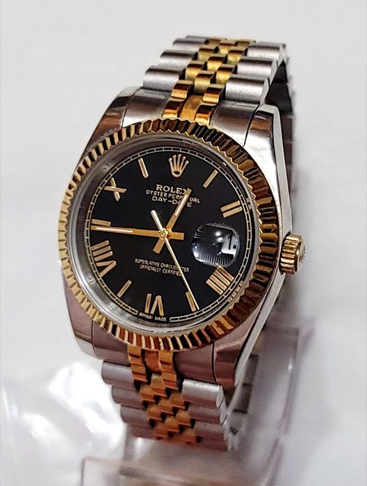Швейцарские часы Rolex в белом цвете с золотом корпус из нерж.стали механизм quartz выпуск Swiss 80х годов марка времён ссср