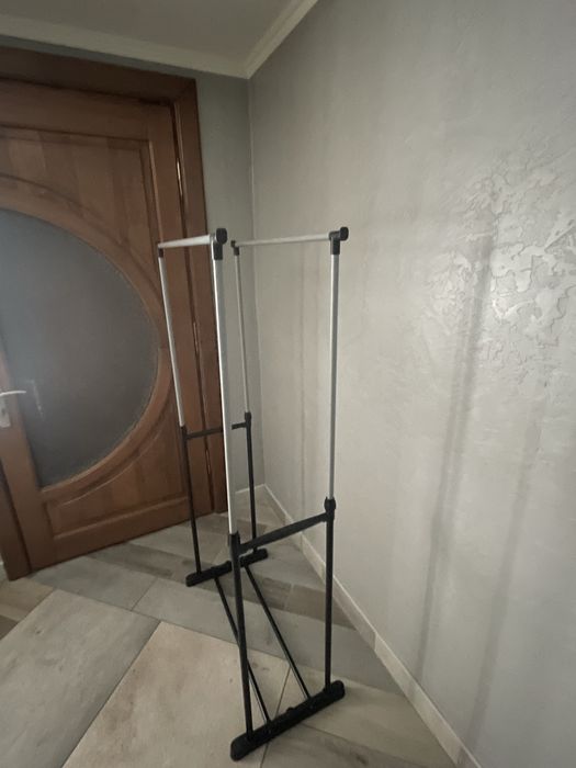 Тримач для одягу