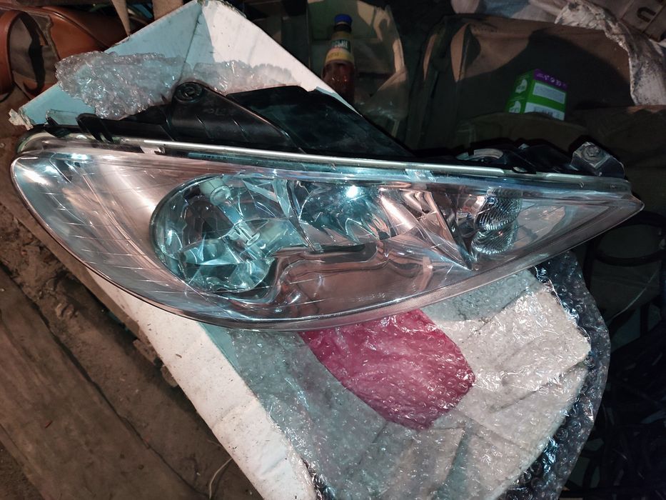 Фари Peugeot 206 оригінал