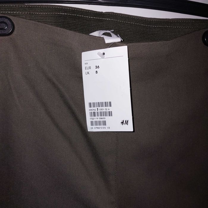 H&M nowe spodnie super stretch khaki r. 36
