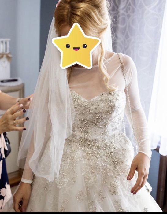 Suknia ślubna Justin Alexander regulowana przez wiązanie gorsetowe