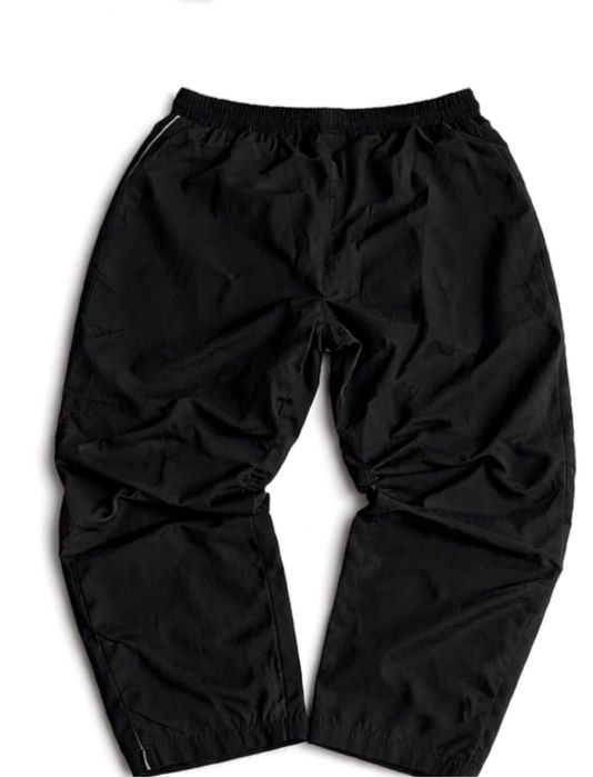 Нейлонові штани Nike