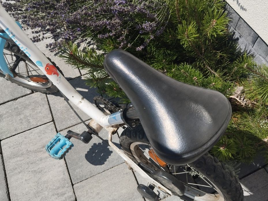Rower btwin koła boczne
