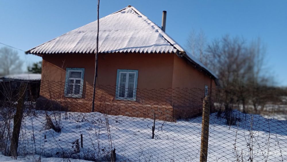 Продається ділянка з будинком