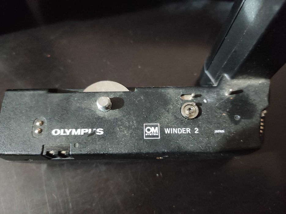 Máquina 35mm Olympus OM 10 com lentes