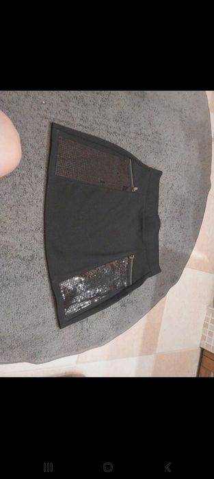 Mini saia de senhora 

80% algodao
20% poliester