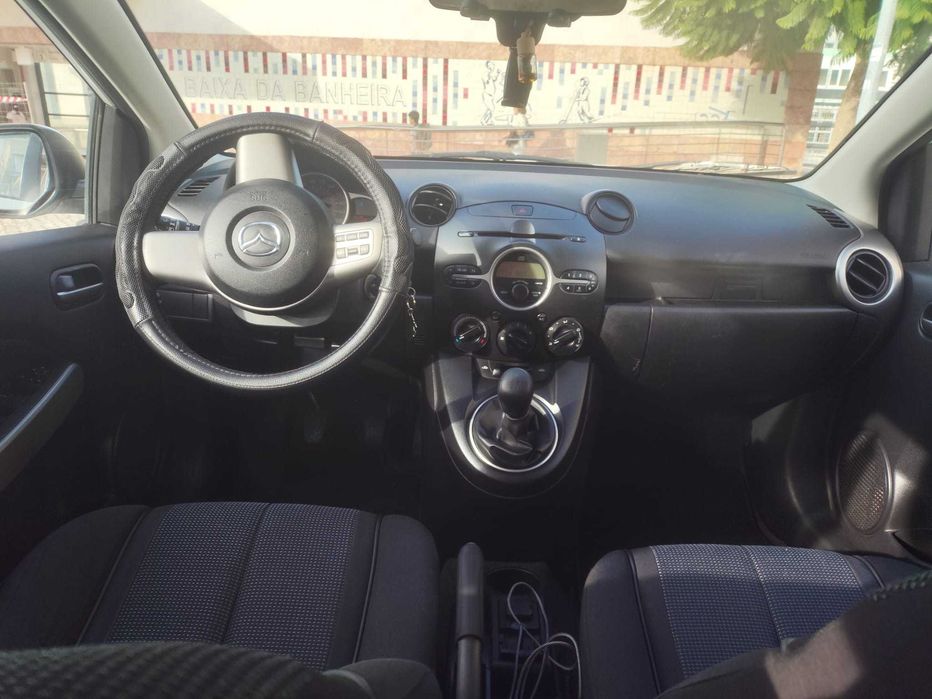 Mazda 2 1.3 gasolina +-211 mil KMS com AC 2010