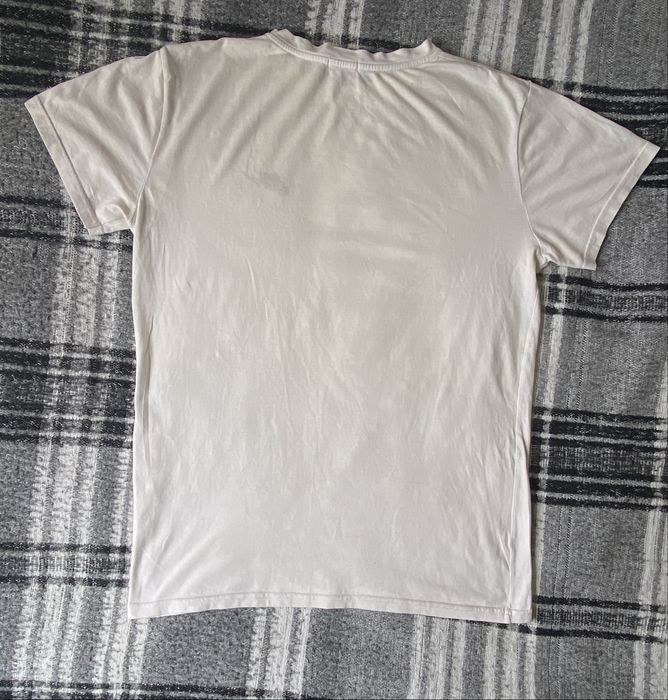 T- shirt nikee estado bom