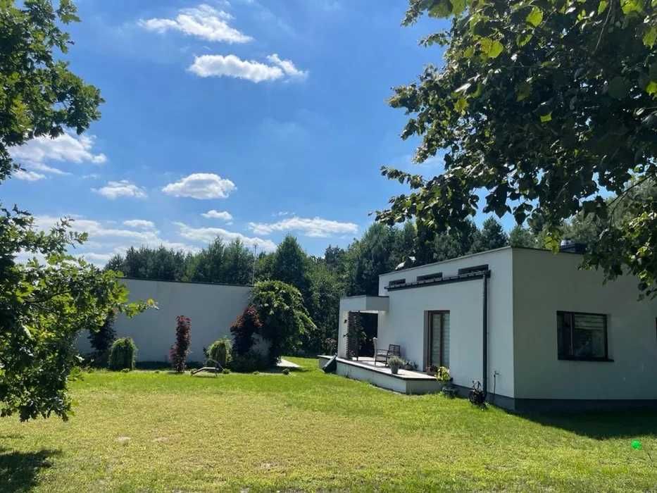 Na sprzedaż dwa Piękne domy parterowe z ogromną działką 1.3h