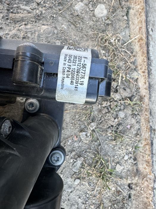 Помпа водяна (насос) охолодження, в зборі з корпусом 06L121111P VAG