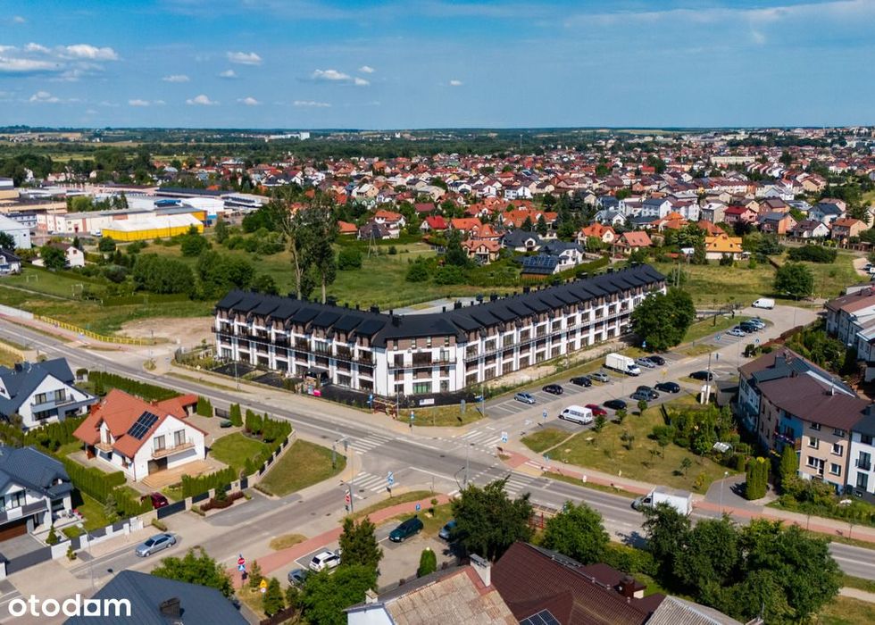 Dwupoziomowe mieszkanie z ogródkiem, Modrzewiowa