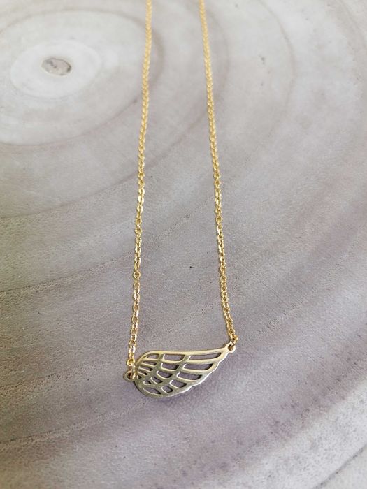 Colar asa em dourado - Aço