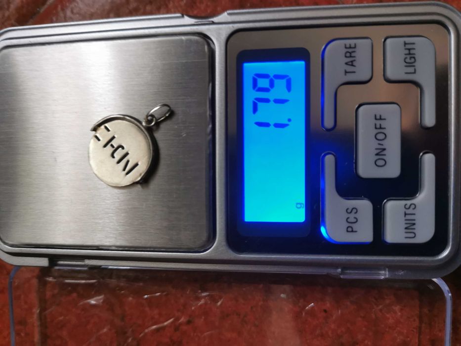 Medalha de prata, rotativa a dizer amo-te