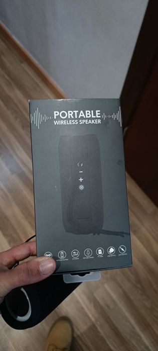 Coluna portátil nova